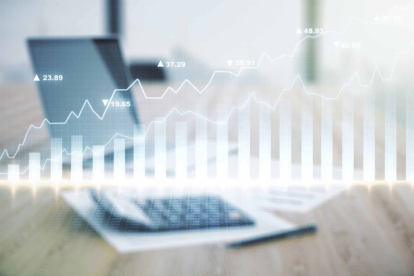 Abstract virtual financial graph hologram on calculator and laptop background, forex and investment concept. Multiexposure